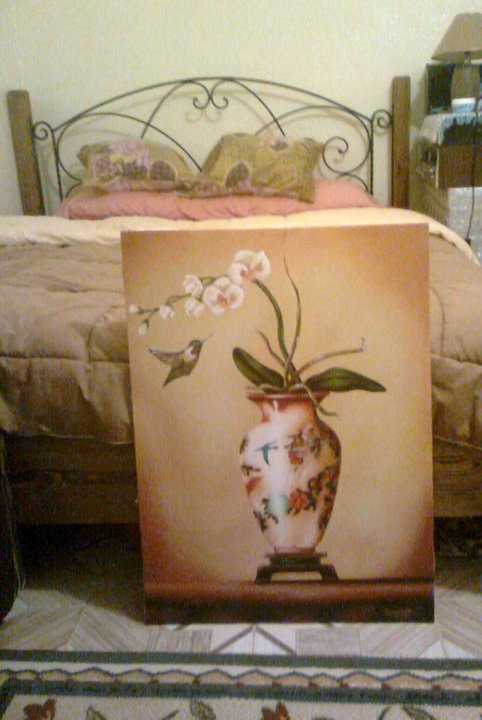 flying hummingbird and orchids with vase still life