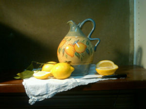 old italian pitcher with lemons