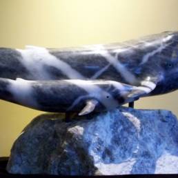 blue marble sculpture whales